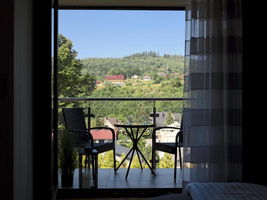 Nespecifikovaný výhled na hory nebo výhled na hory při pohledu z apartmánu