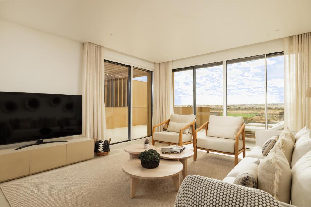 TV a/nebo společenská místnost v ubytování Verdelago Resort
