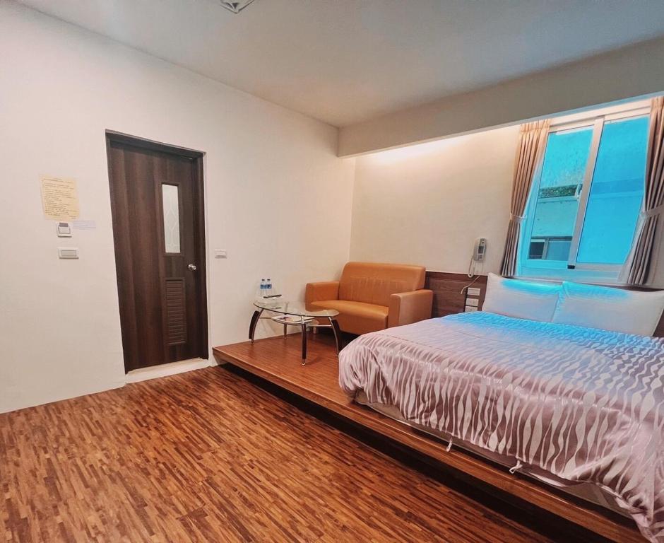 Postel nebo postele na pokoji v ubytování Shang Ti Sitou B&B