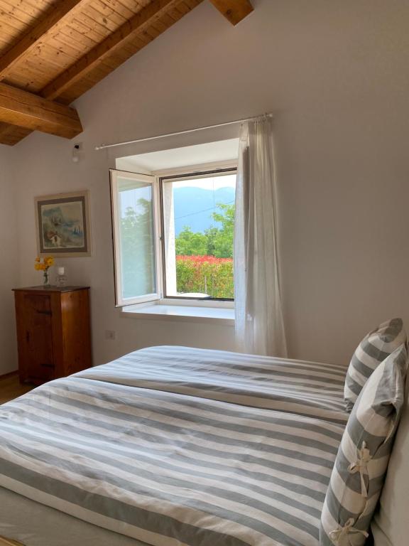 Postel nebo postele na pokoji v ubytování B&B Casa Trambasore
