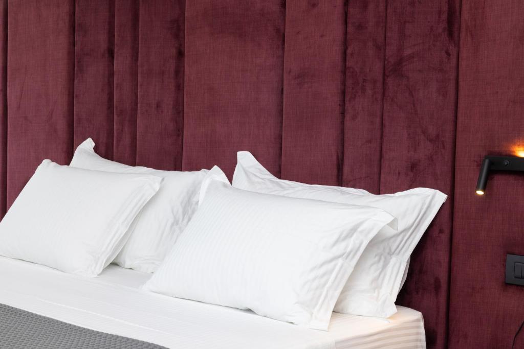 Postel nebo postele na pokoji v ubytování Lans Hotel
