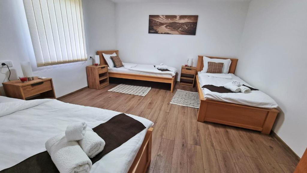 Krevet ili kreveti u jedinici u objektu Apartmani - Kladovski Konak