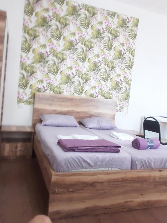 Postel nebo postele na pokoji v ubytování Guest House Buche 219