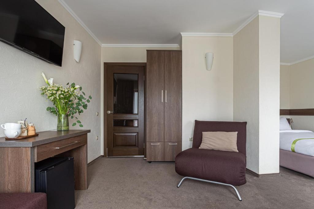 Postel nebo postele na pokoji v ubytování Graal resort