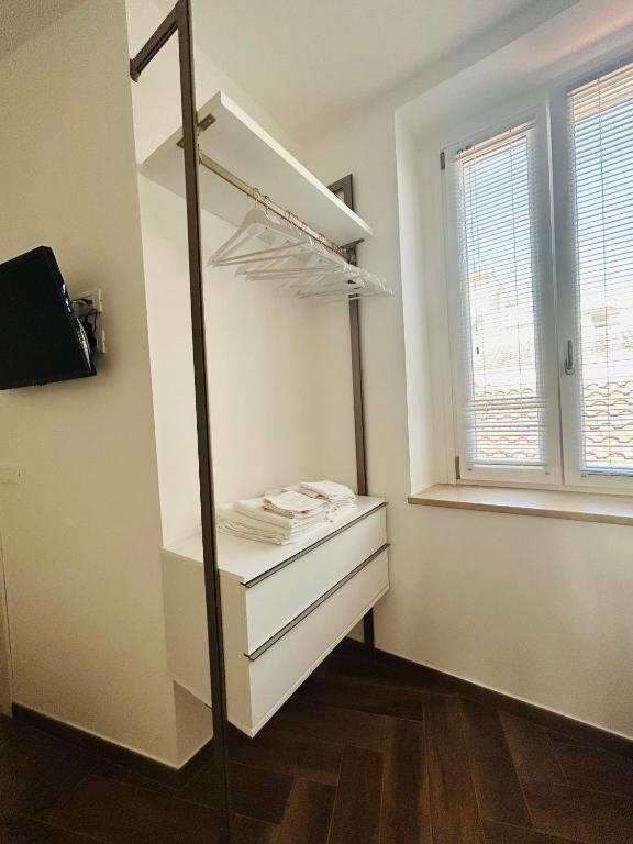 Postel nebo postele na pokoji v ubytování Dimora Santucci