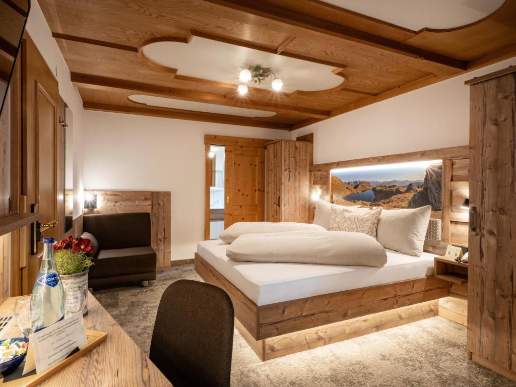 Postel nebo postele na pokoji v ubytování Hotel Garni Ferienhof