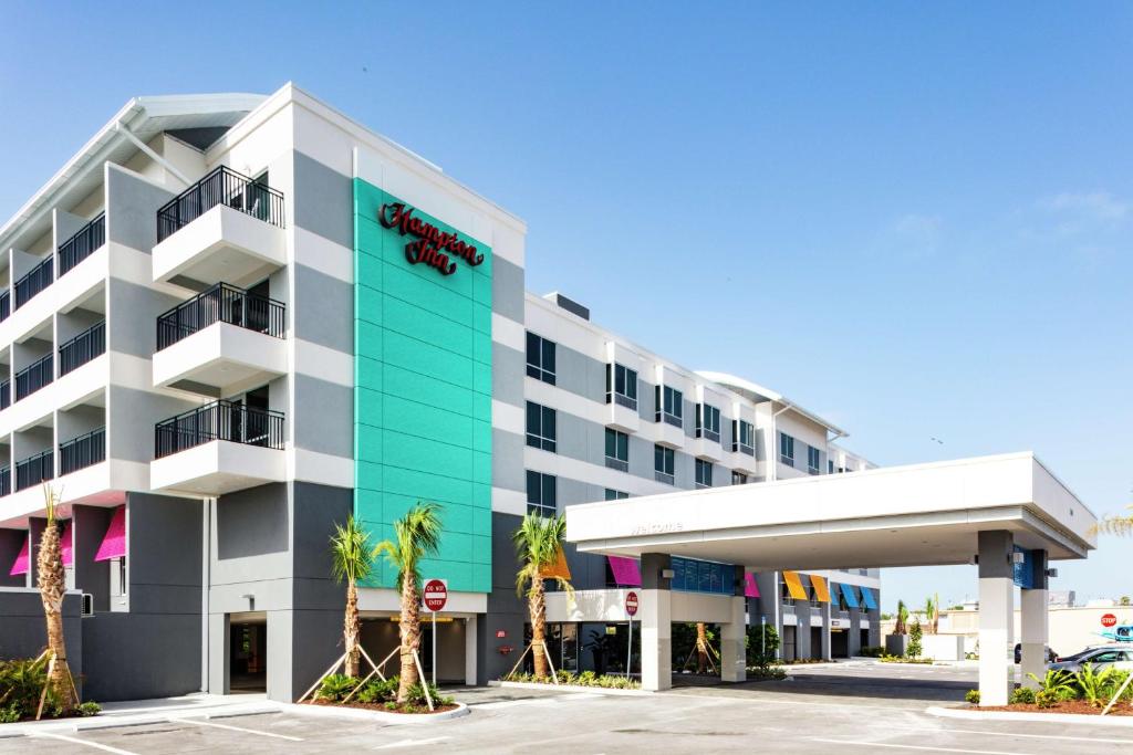 a rendering of a hotel with a gas station at Hampton Inn Dunedin, Fl in Dunedin