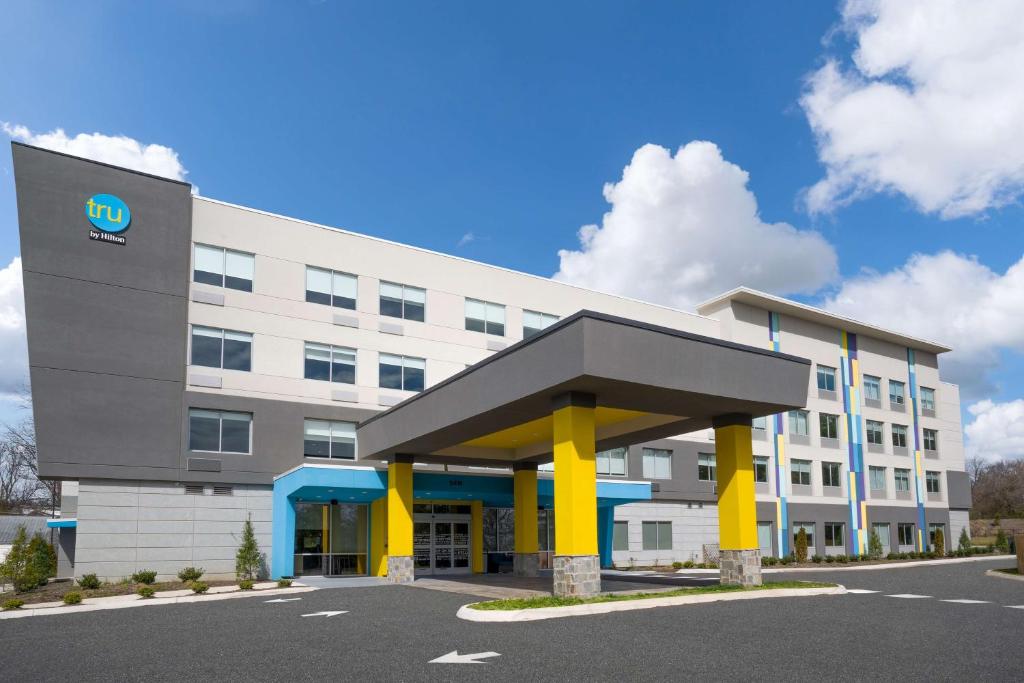 an office building with a large building at Tru By Hilton Knoxville North I 75 in Knoxville