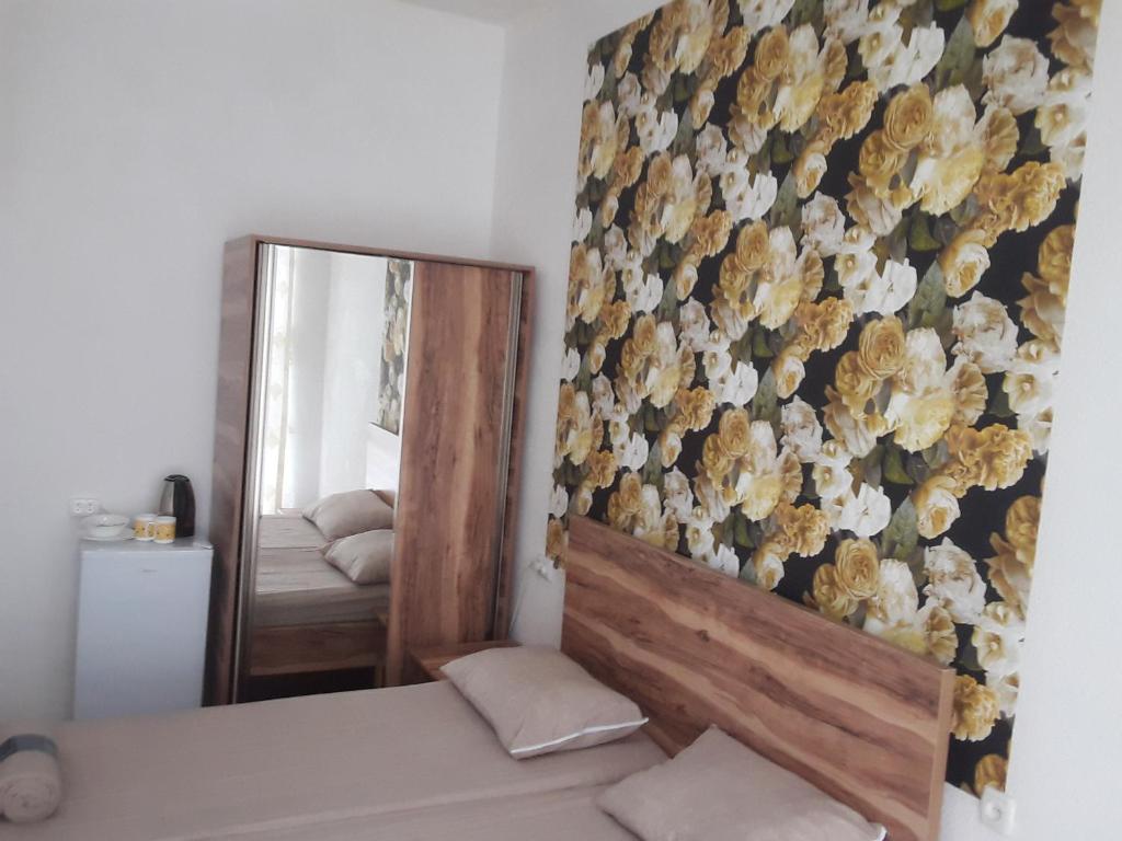 Postel nebo postele na pokoji v ubytování Guest House Buche 219