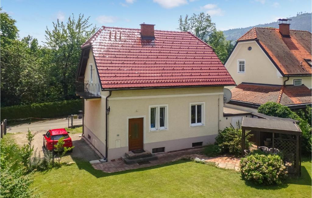 a small white house with a red roof at 4 Bedroom Beautiful Home In Deutschlandsberg in Deutschlandsberg
