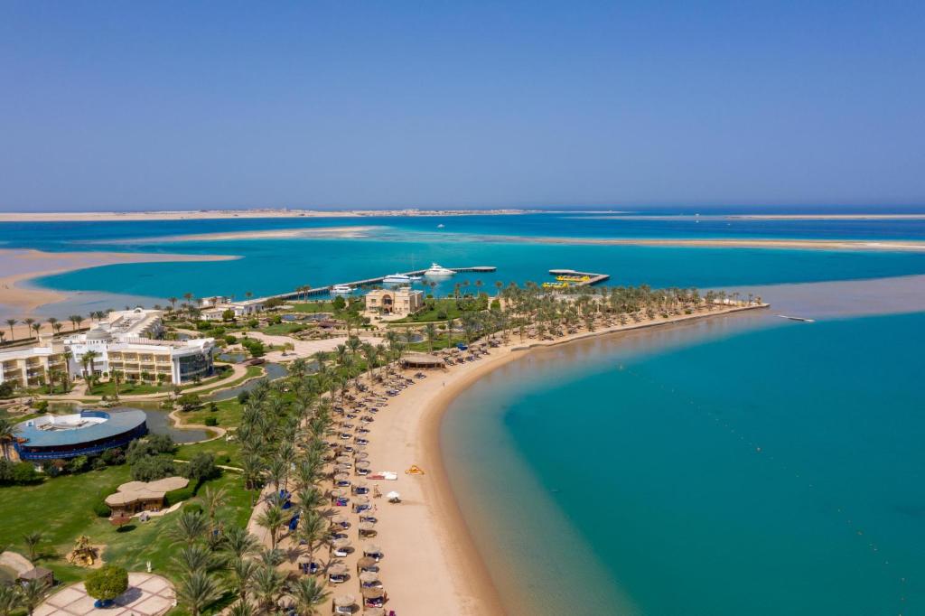 an aerial view of a beach with a resort at Palm Royale Resort - Soma Bay in Hurghada