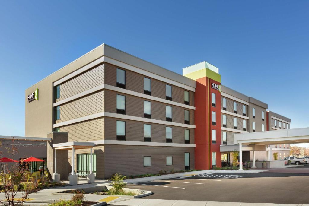 a rendering of the front of a building at Home2 Suites By Hilton Portland Airport in Portland