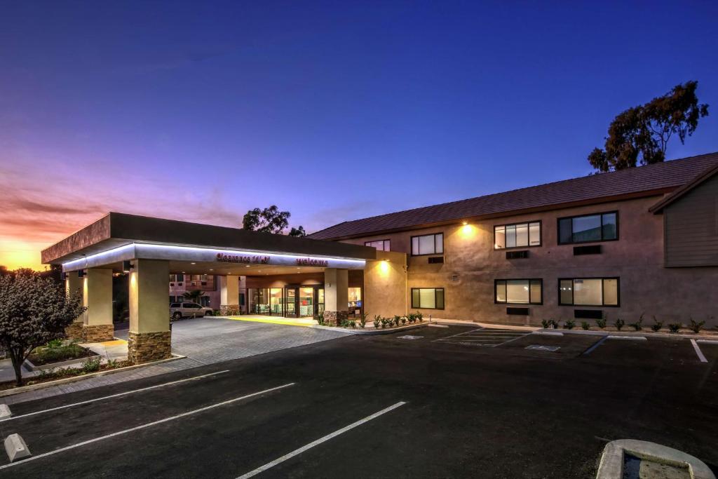 an empty parking lot in front of a hotel at Hampton by Hilton Encinitas-Cardiff Beach Area in Encinitas