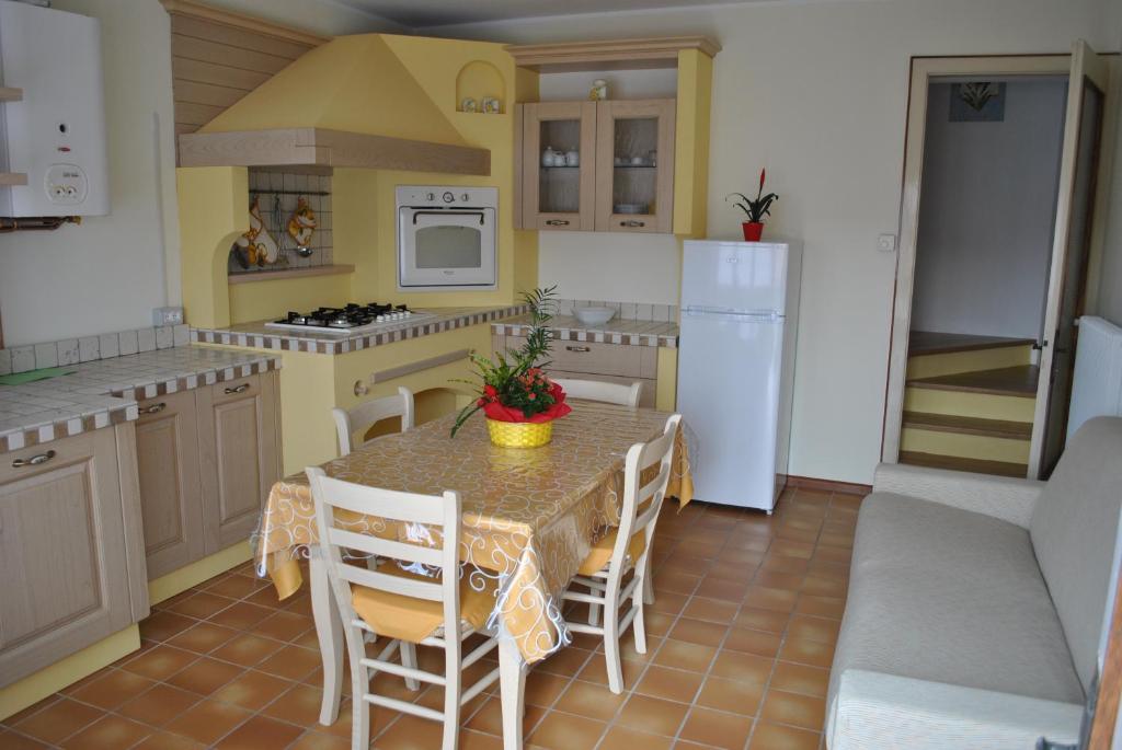 Kuchyň nebo kuchyňský kout v ubytování Appartamento Corte dei Molini