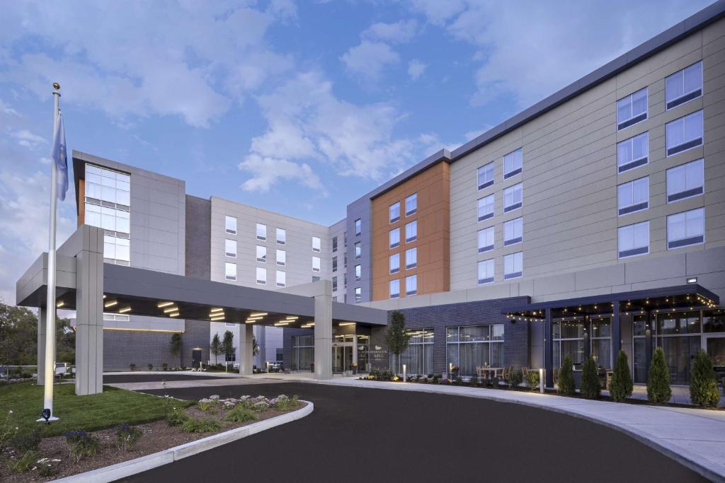 a rendering of the front of a hotel at Homewood Suites by Hilton Boston Woburn in Woburn
