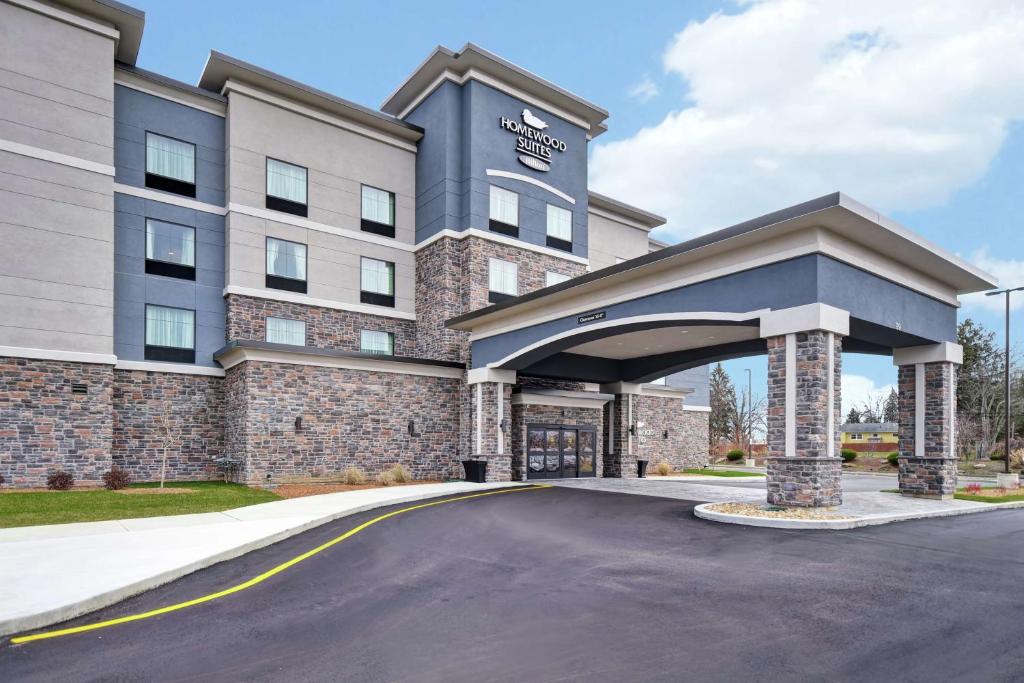 a rendering of the front of a hotel at Homewood Suites By Hilton Orange New Haven in Orange