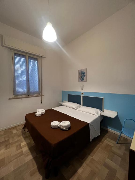 Postel nebo postele na pokoji v ubytování New Hotel Villa Enea