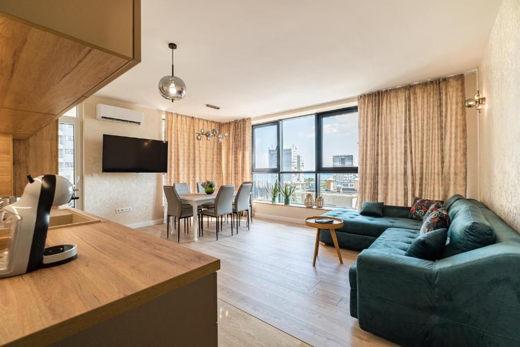 Et tv og/eller underholdning på Metalex Garden 2bdrm Luxury Apartment