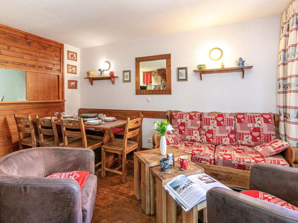 a living room with a couch and a table at Appartement Val-d'Isère, 4 pièces, 6 personnes - FR-1-694-139 in Val-d'Isère