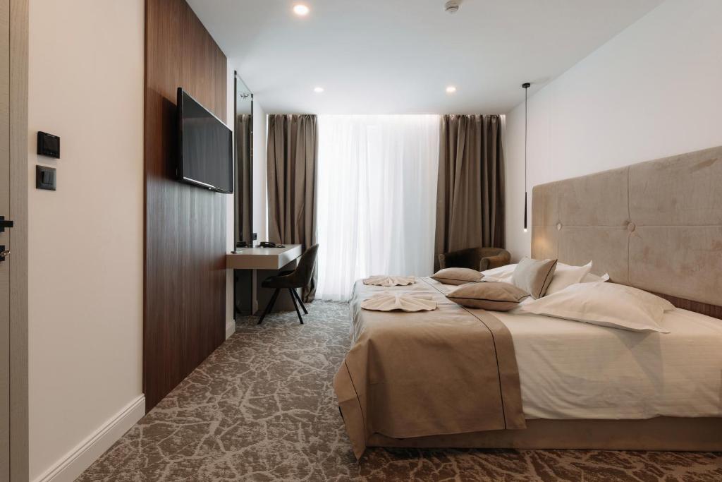 Krevet ili kreveti u jedinici u objektu Hotel Fanat