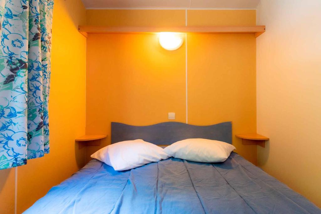 Postel nebo postele na pokoji v ubytování Le Clos de Barbey