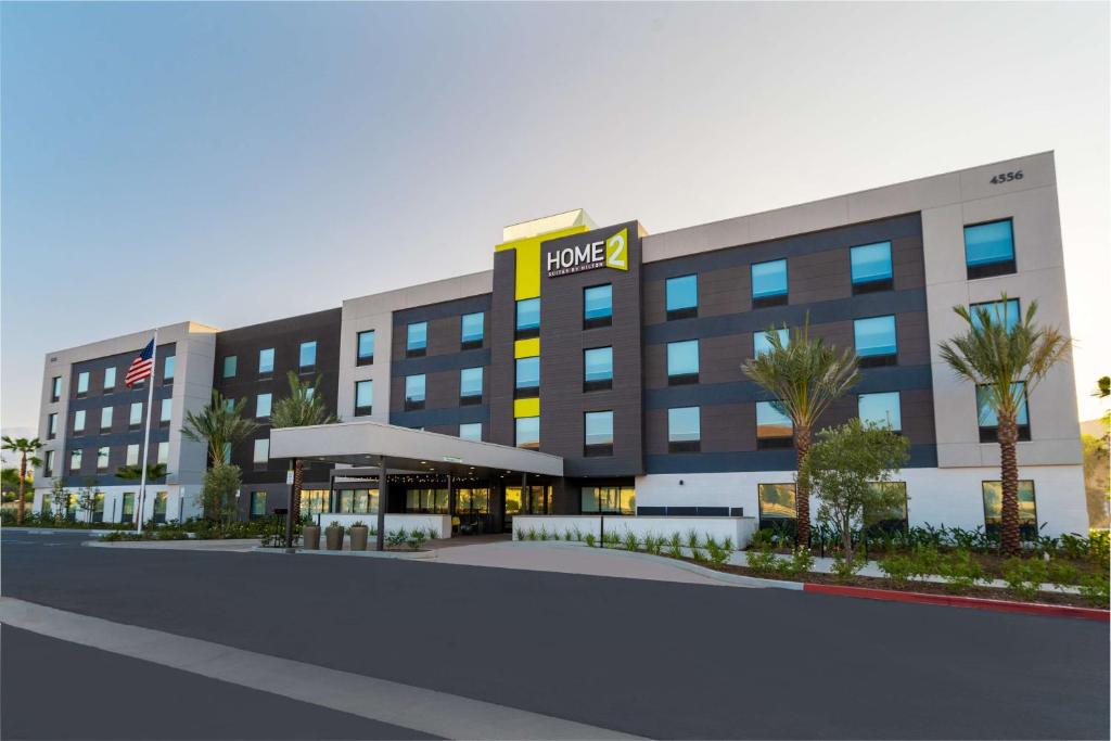 a rendering of a building with a hotel at Home2 Suites Corona, Ca in Corona