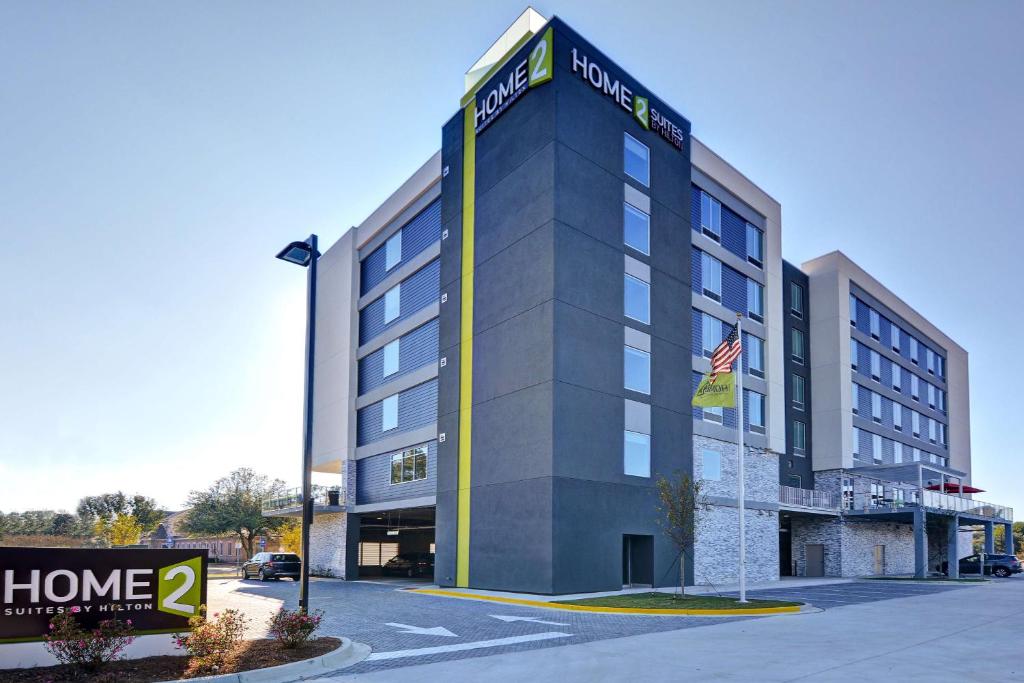 a building with a home sign in front of it at Home2 Suites By Hilton Savannah Midtown, Ga in Savannah
