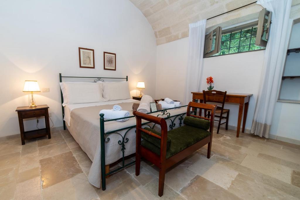 Postel nebo postele na pokoji v ubytování Masseria Lamiola Piccola