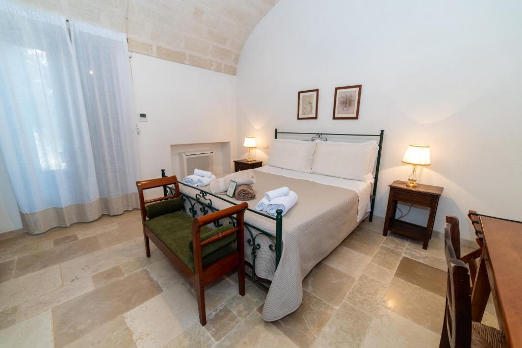Postel nebo postele na pokoji v ubytování Masseria Lamiola Piccola