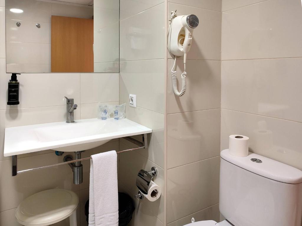 Koupelna v ubytování Hotel Porto