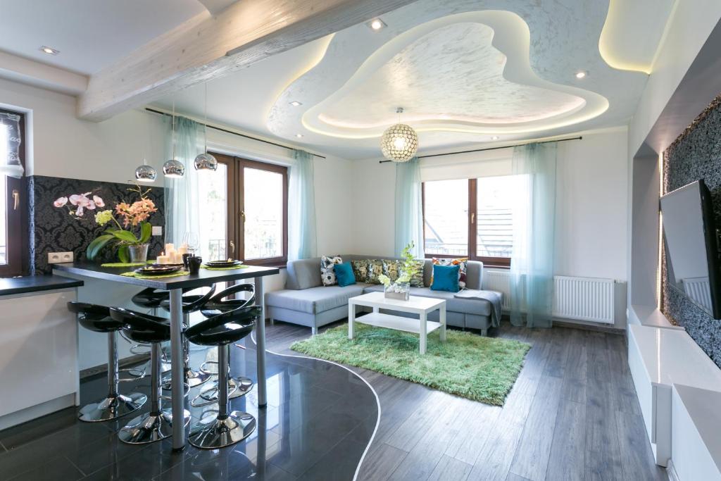 Posedenie v ubytovaní VIP Apartamenty Widokowe