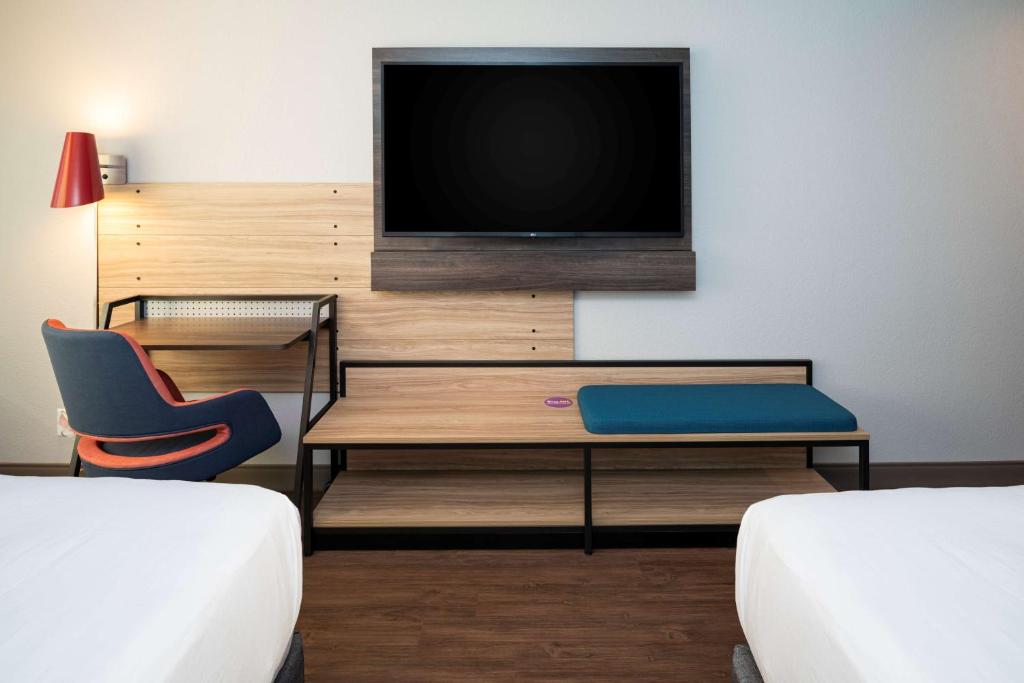 Postel nebo postele na pokoji v ubytování Tru By Hilton Phoenix Glendale Westgate