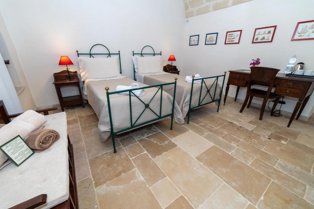Postel nebo postele na pokoji v ubytování Masseria Lamiola Piccola