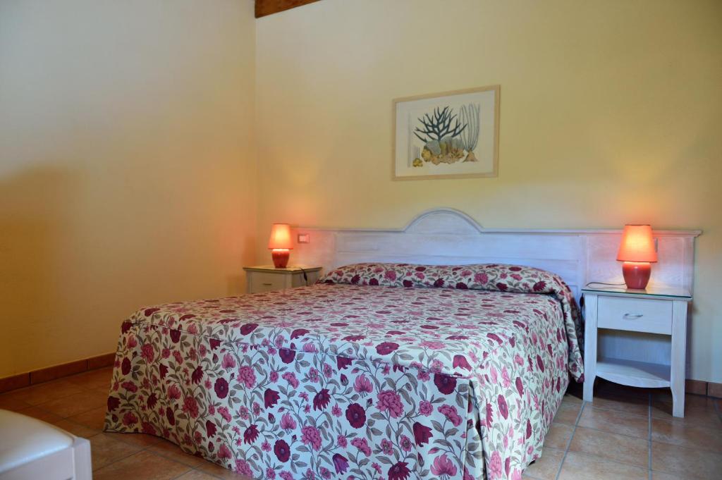 Postel nebo postele na pokoji v ubytování Hotel Acquasanta
