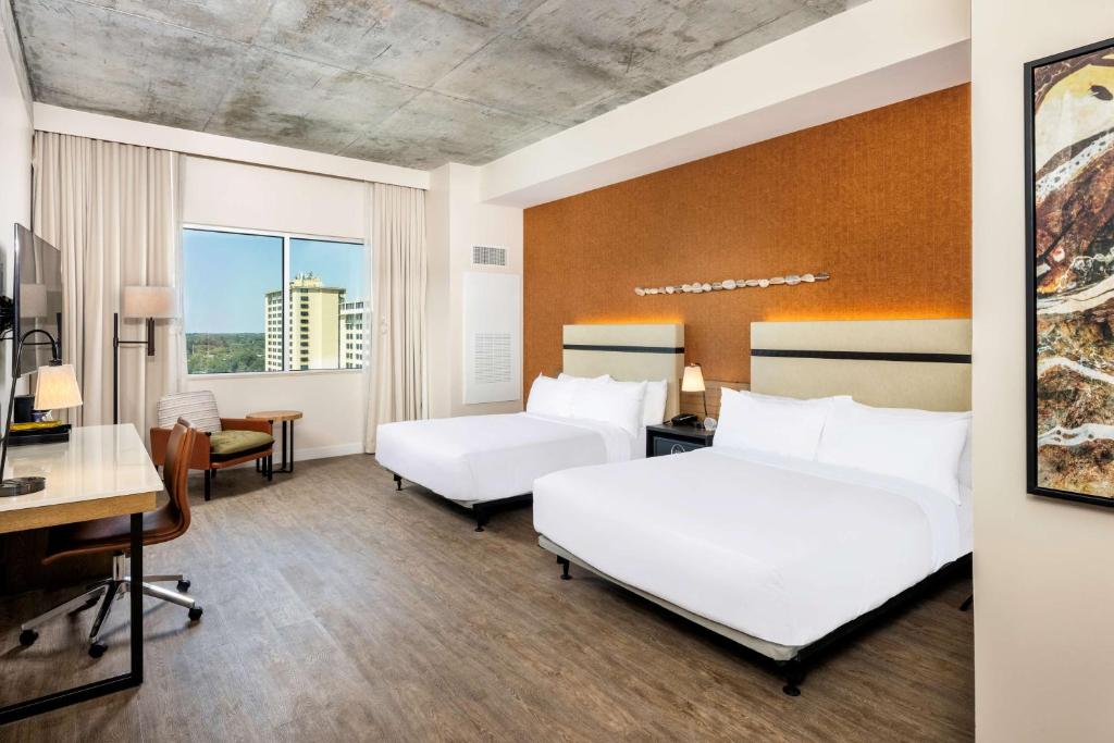 Postel nebo postele na pokoji v ubytování Hotel Melby Downtown Melbourne Tapestry Collection By Hilton
