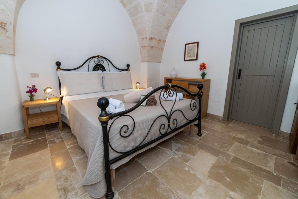 Postel nebo postele na pokoji v ubytování Masseria Lamiola Piccola