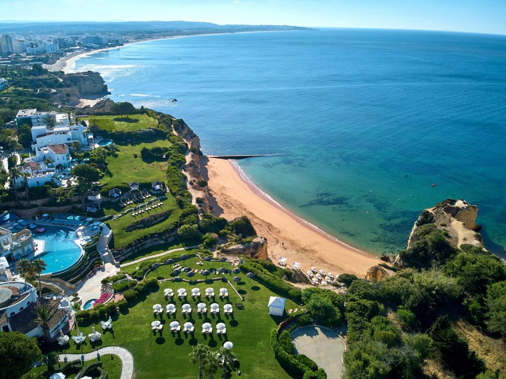an aerial view of a beach and the ocean at Vila Vita Parc Resort & Spa in Armação de Pêra