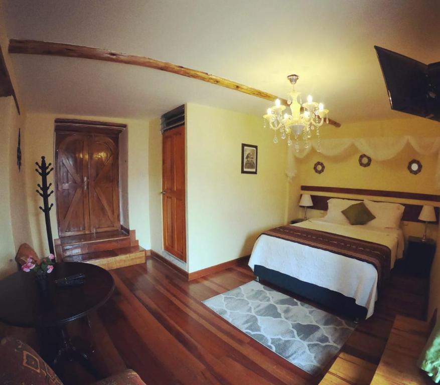 Postel nebo postele na pokoji v ubytování Kori Gems Inn