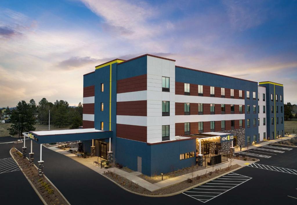 a rendering of a building in a parking lot at Home2 Suites By Hilton Bend, Or in Bend