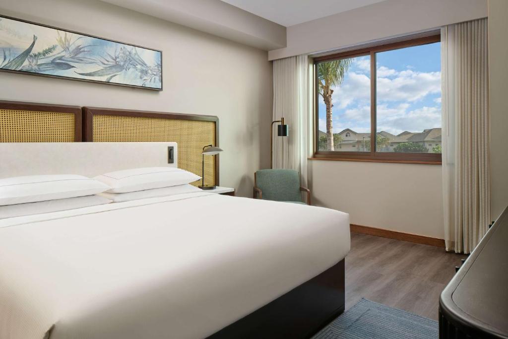 Postel nebo postele na pokoji v ubytování Hilton Grand Vacations Club Maui Bay Villas