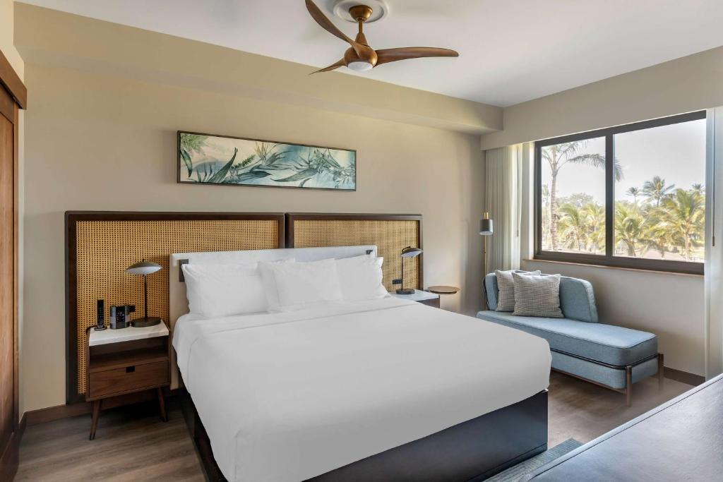 Postel nebo postele na pokoji v ubytování Hilton Grand Vacations Club Maui Bay Villas