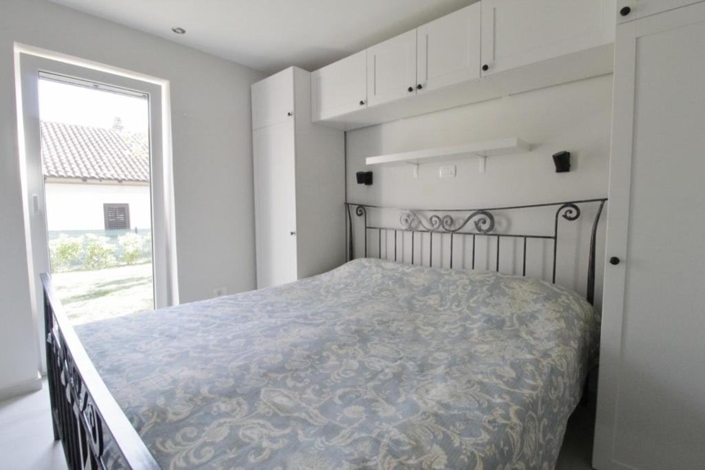 Postel nebo postele na pokoji v ubytování Holiday house Andreja