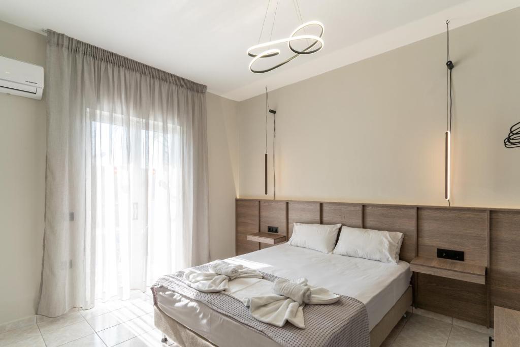 Postel nebo postele na pokoji v ubytování Hera Zakynthos Hotel