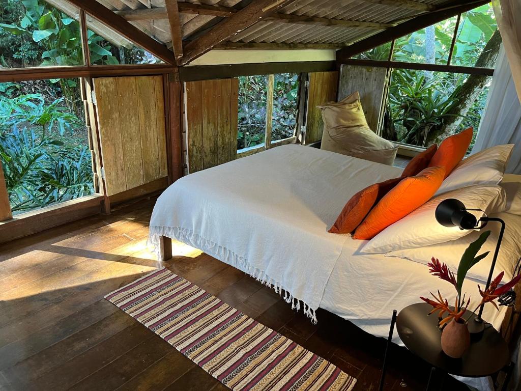 Postel nebo postele na pokoji v ubytování Jungle Lodge