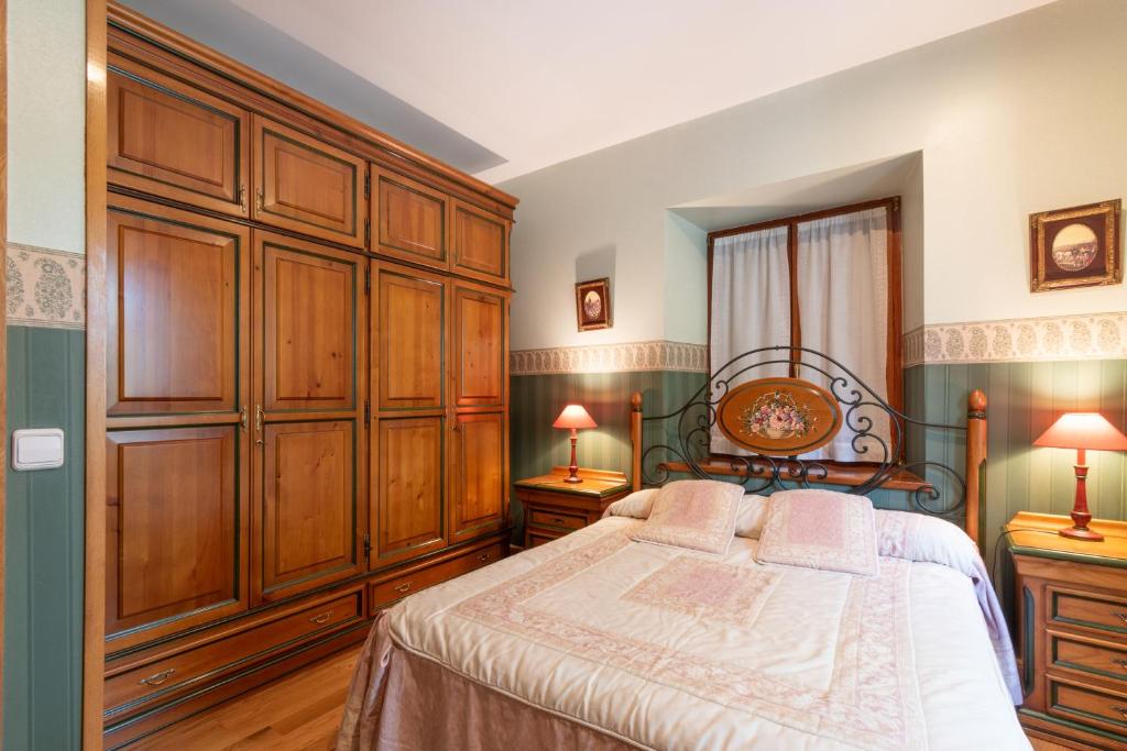Postel nebo postele na pokoji v ubytování Villa Ganbara, 5 minutos de Pamplona