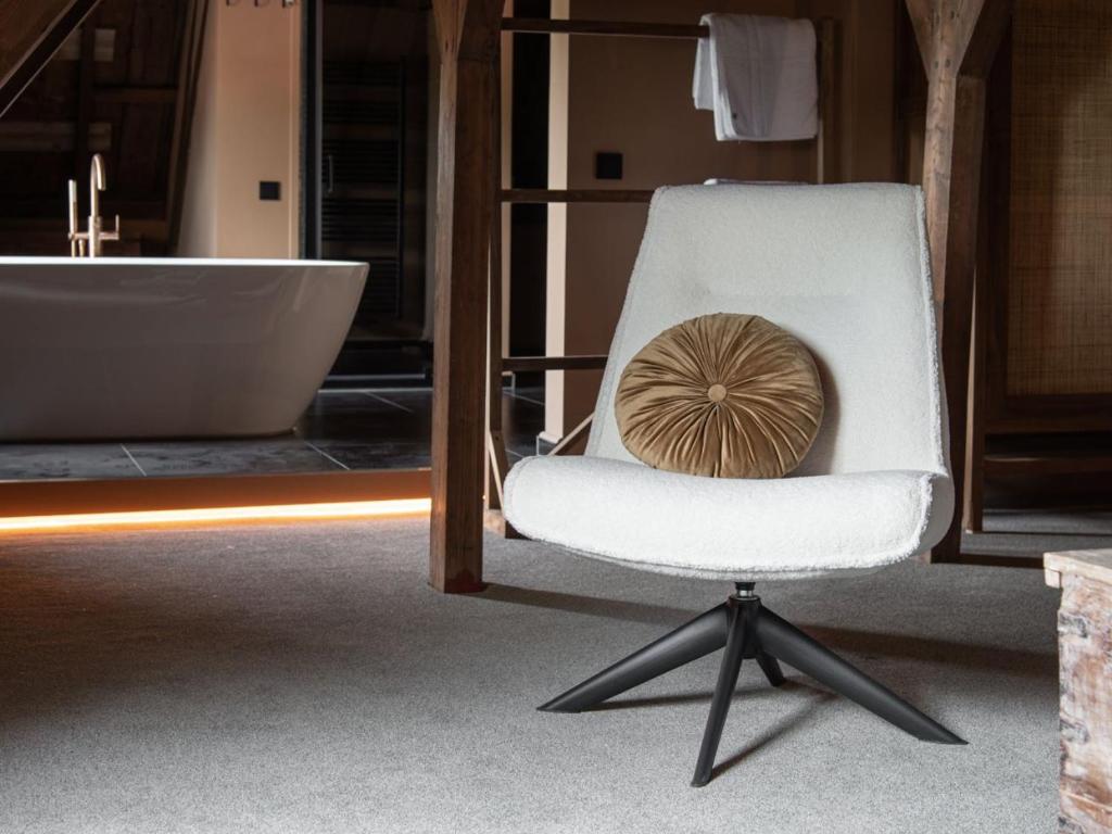 Posezení v ubytování B&B Slapen bij DKW