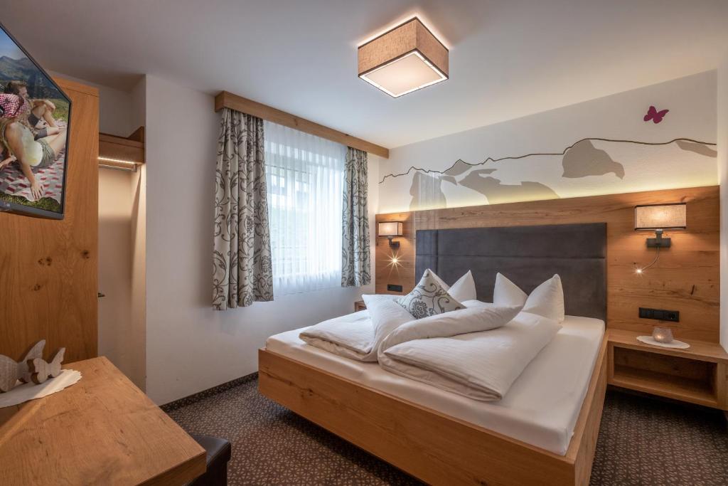 Postel nebo postele na pokoji v ubytování Apartments Schöne Aussicht