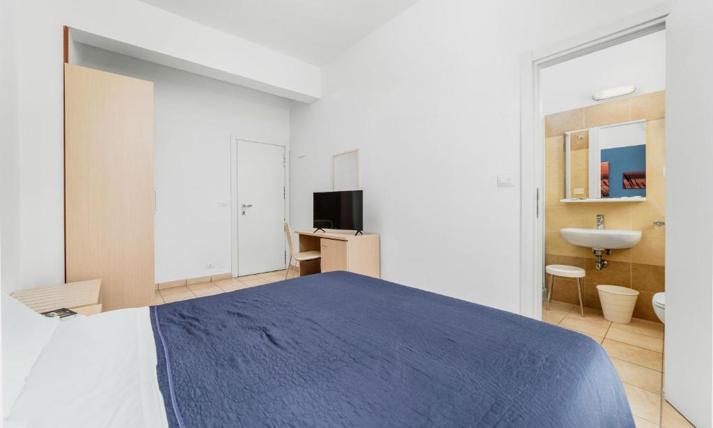 TV a/nebo společenská místnost v ubytování HOTEL OLIVER