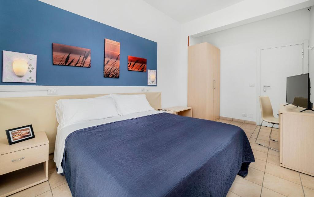 Postel nebo postele na pokoji v ubytování HOTEL OLIVER