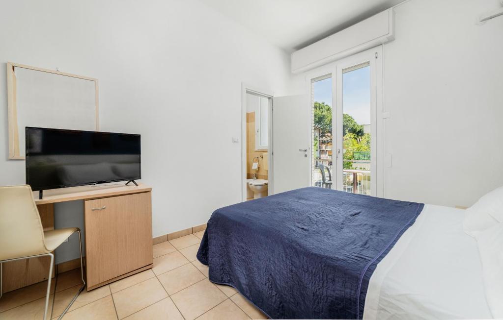 TV a/nebo společenská místnost v ubytování HOTEL OLIVER